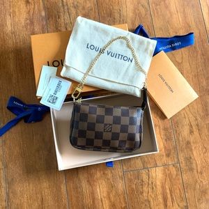 NWT authentic LV mini pochette